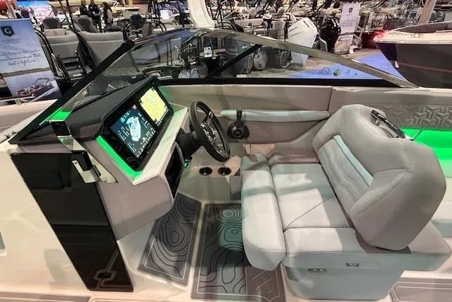 Slide: The Image of 2026 Regal LS6 Surf boat interior with modern dashboard and luxurious seating. - 6
