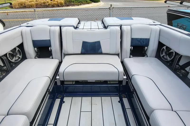 Slide: The Image of 2021 Malibu Wakesetter 23 MXZ interior with luxurious seating and modern design. - 20