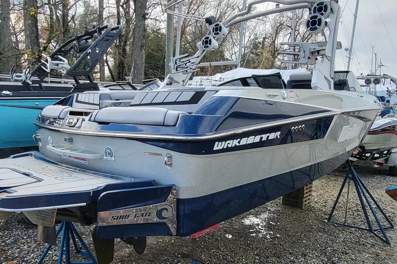 Slide: The Image of 2021 Malibu Wakesetter 23 MXZ boat on display, featuring sleek design and advanced wakeboarding features. - 3