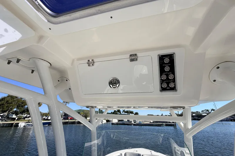Slide: The Image of 2018 Sea Fox 248 Commander boat console with storage and control panel. - 11