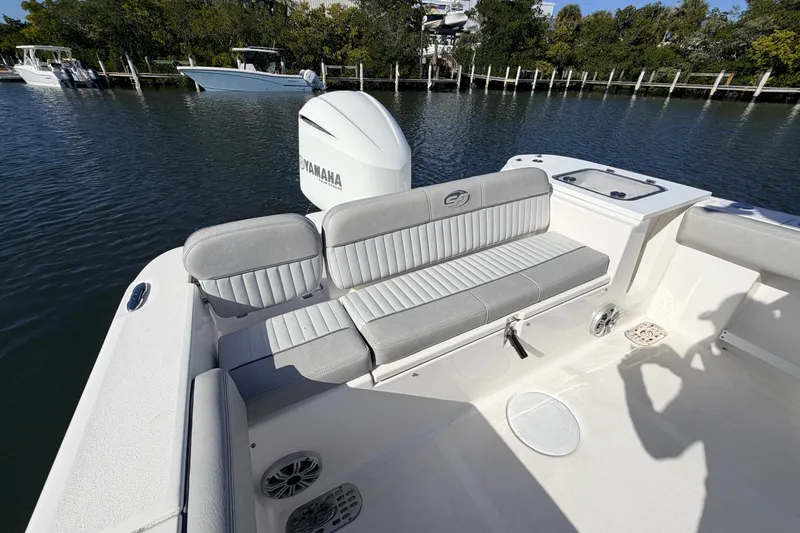 Slide: The Image of 2018 Sea Fox 248 Commander boat with Yamaha engine, featuring comfortable seating and sleek design. - 16