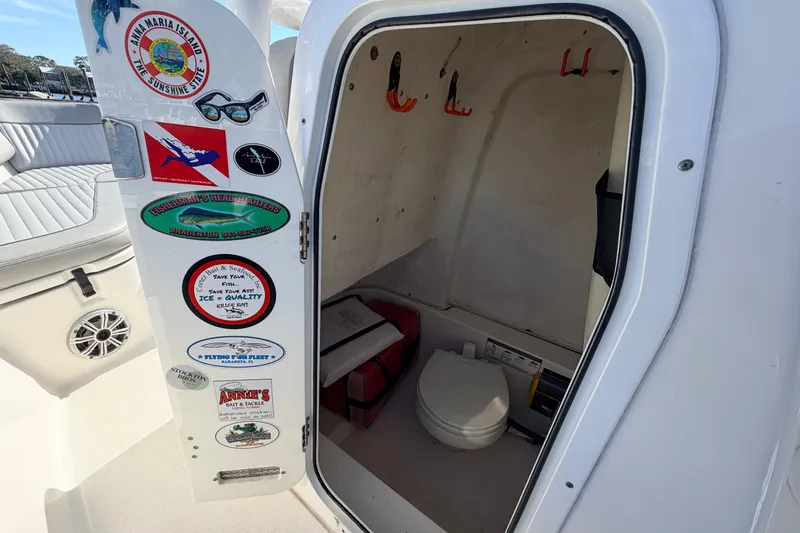 Slide: The Image of 2018 Sea Fox 248 Commander boat cabin with stickers and marine toilet. - 19