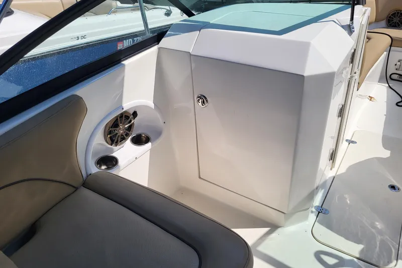 Slide: The Image of 2018 NauticStar 2302 Legacy boat with Yamaha engine in snowy outdoor setting. - 3