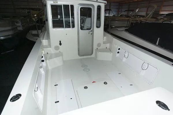 Slide: The Image of Osprey Pilothouse 24 Fisherman 2006 - 7