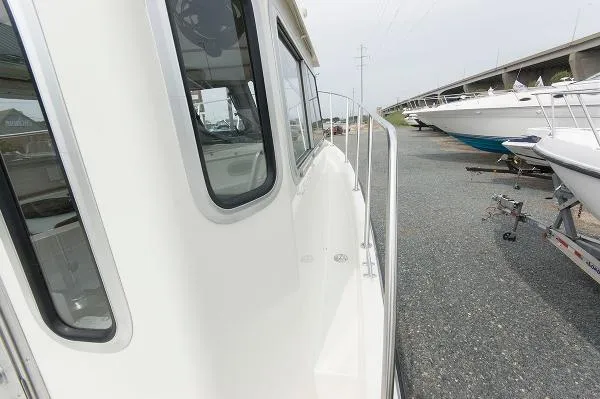 Slide: The Image of Osprey Pilothouse 24 Fisherman 2006 - 8