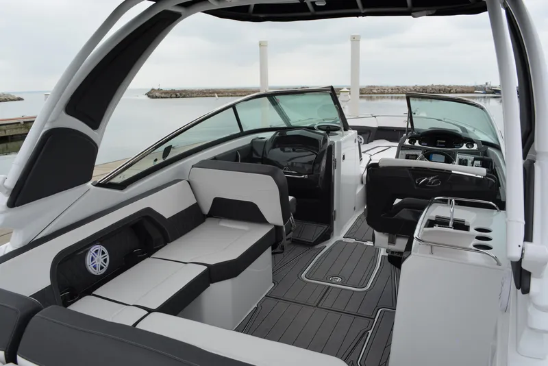 Slide: The Image of Interior of 2023 Monterey 305SS Super Sport boat at dock. - 13