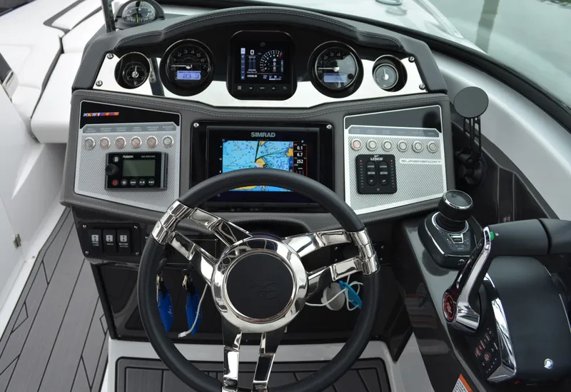 Slide: The Image of Dashboard of 2023 Monterey 305SS Super Sport boat. - 18