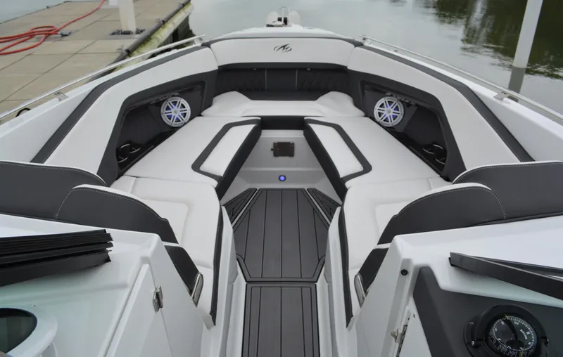 Slide: The Image of Interior of 2023 Monterey 305SS Super Sport boat at dock. - 21