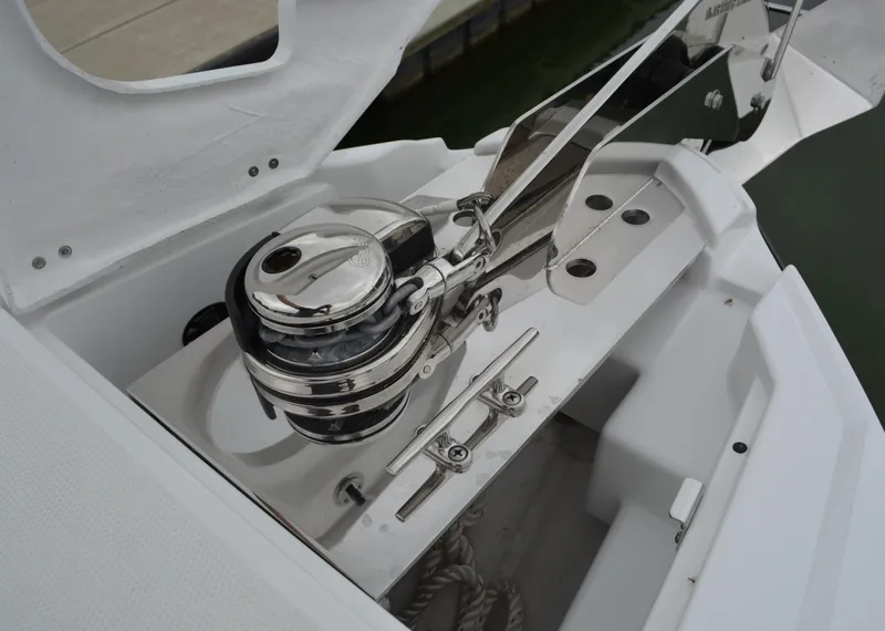 Slide: The Image of Anchor winch on a 2023 Monterey 305SS Super Sport boat. - 23