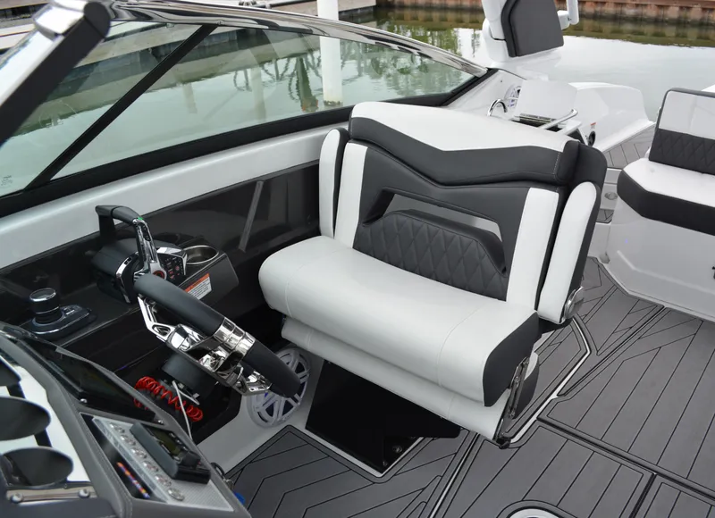 Slide: The Image of Interior of 2023 Monterey 305SS Super Sport boat, luxurious seating area. - 25