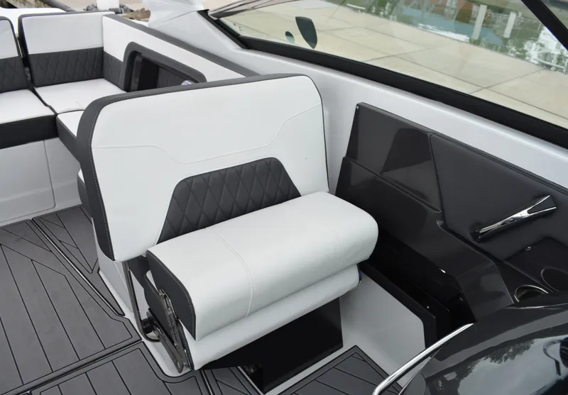 Slide: The Image of Interior of 2023 Monterey 305SS Super Sport boat, luxurious seating. - 26