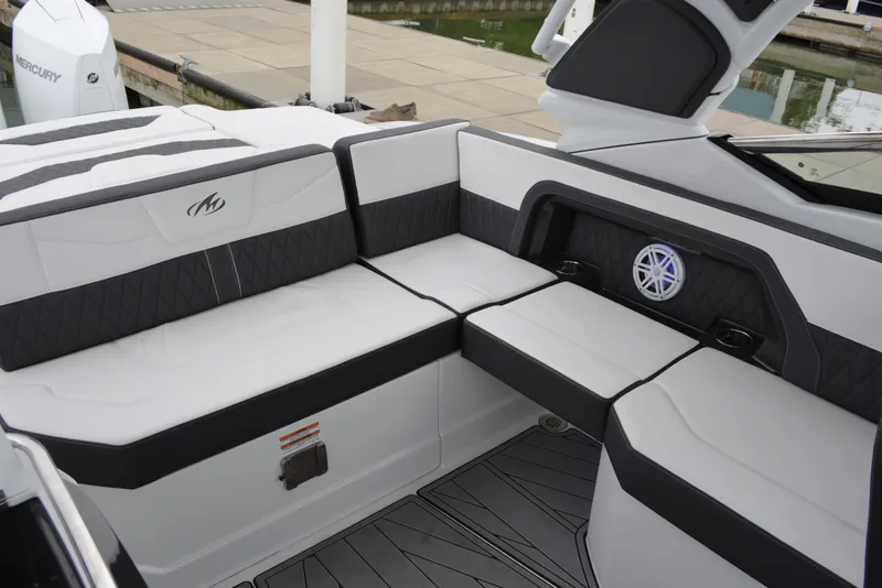 Slide: The Image of Interior of 2023 Monterey 305SS Super Sport boat, gray and white upholstery. - 28