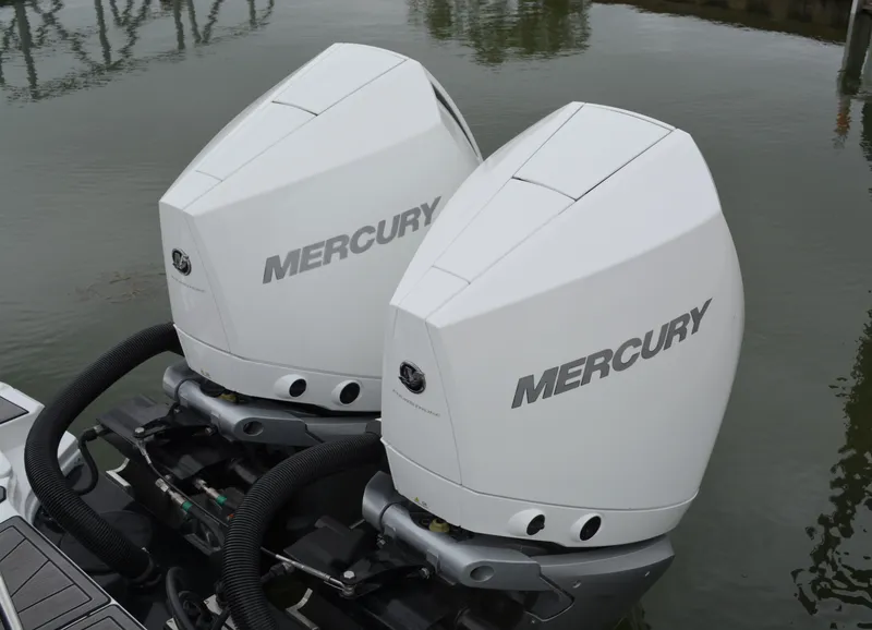 Slide: The Image of Two Mercury outboard engines on a 2023 Monterey 305SS Super Sport boat. - 6