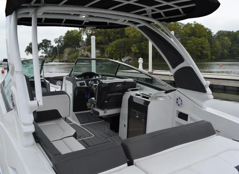Slide: The Image of Interior of 2023 Monterey 305SS Super Sport boat at dock. - 8