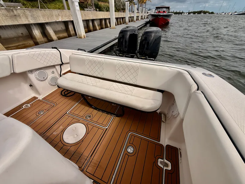 Slide: The Image of 2008 Carrera Powerboats 32 Center Console at dock with wooden flooring. - 14