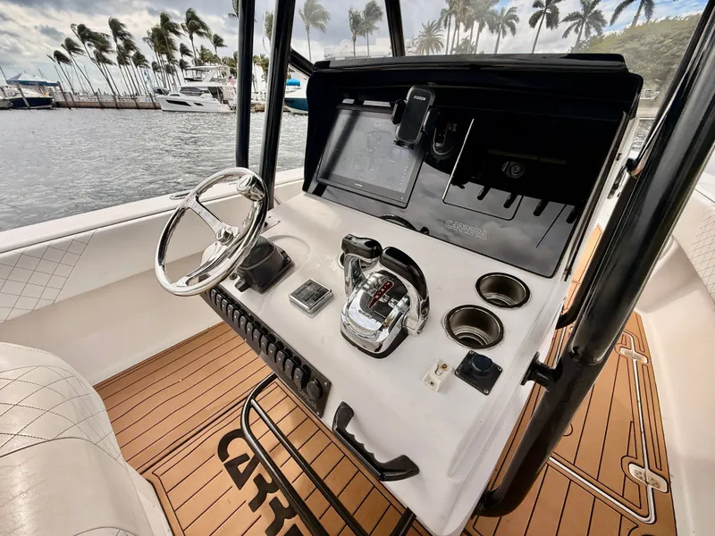 Slide: The Image of Helm of a 2008 Carrera Powerboats 32 Center Console. - 6