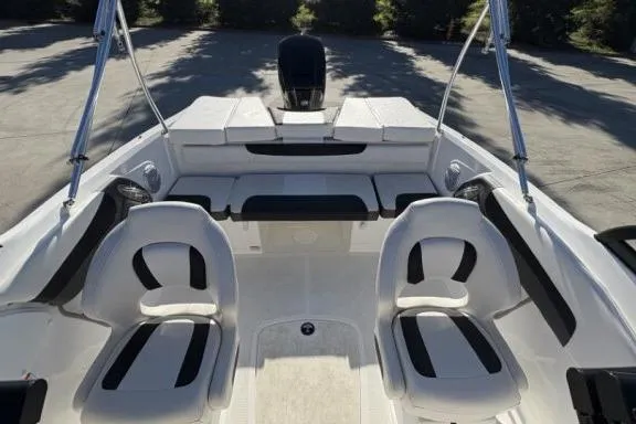 Slide: The Image of 2022 Tahoe 200 S boat interior with seating and motor, showcasing modern design. - 10