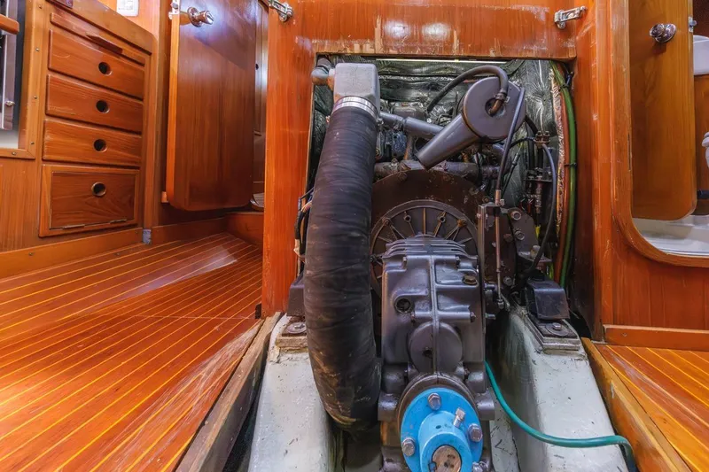 Slide: The Image of Engine room of 1983 Baltic 42 DP sailboat with wooden interior detailing. - 43