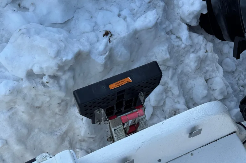 Slide: The Image of Steiger Craft 23 Miami 2008 boat detail on snow-covered ground. - 21