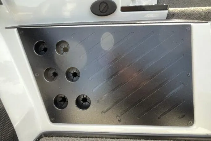 Slide: The Image of 2016 Nitro Z18 boat interior panel with multiple circular vents. - 16