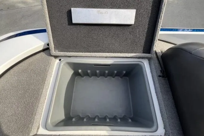 Slide: The Image of Open storage compartment in 2016 Nitro Z18 boat, featuring a spacious interior. - 21