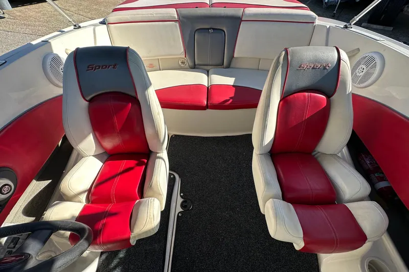 Slide: The Image of 2007 Sea Ray 195 Sport boat interior with red and white seating, showcasing sporty design. - 7