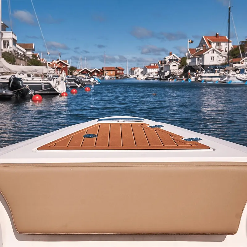 Slide: The Image of Bow view of 2023 Northstar Orion 7 boat in a scenic harbor. - 3