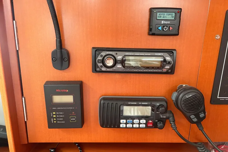 Slide: The Image of Control panel of a 2006 Beneteau Oceanis Clipper 393 yacht with radio and heater controls. - 22