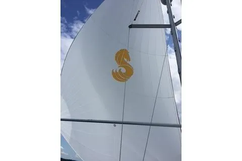 Slide: The Image of Sail of 2006 Beneteau Oceanis Clipper 393 against blue sky. - 4