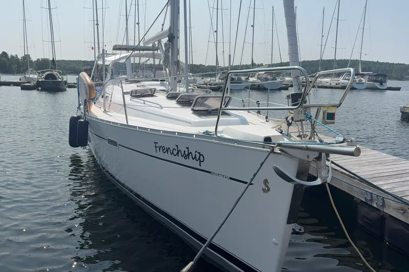 Slide: The Image of 2006 Beneteau Oceanis Clipper 393 sailboat docked in a marina. - 7