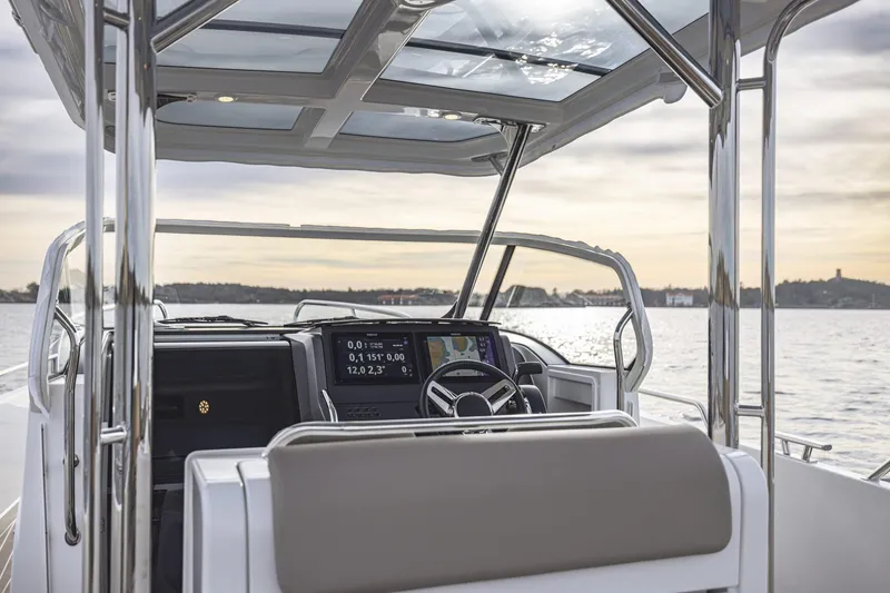 Slide: The Image of Interior view of Nimbus Tender 9 boat, 2025 model, featuring modern cockpit. - 4