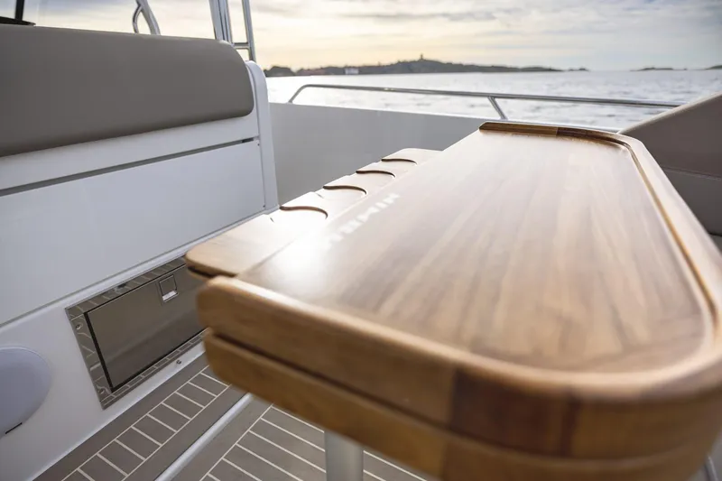 Slide: The Image of Wooden table on Nimbus Tender 9 boat, year 2025. - 6