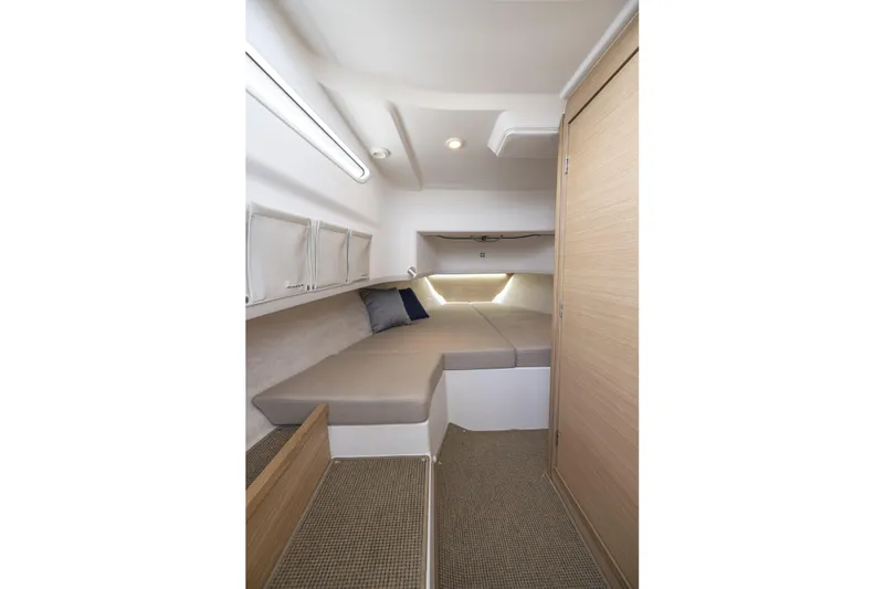 Slide: The Image of Interior of Nimbus Tender 9 yacht, 2025 model, featuring cozy bed. - 9