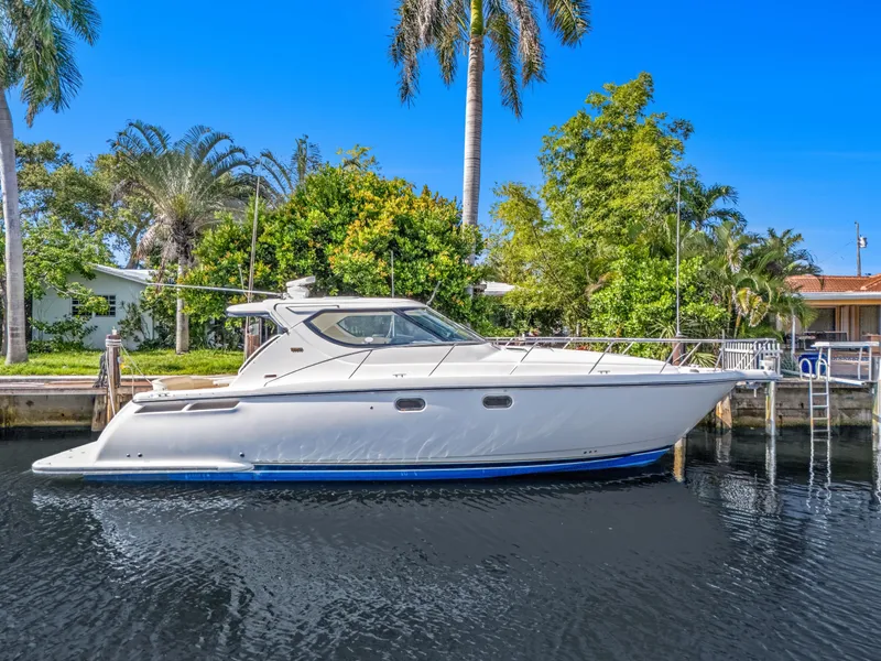 The Image of 2006 Tiara Yachts 4300 Sovran against tropical backdrop. - 0
