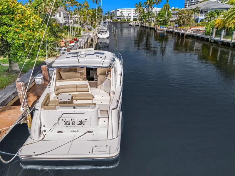 Slide: The Image of 2006 Tiara Yachts 4300 Sovran in canal, tropical setting. - 1