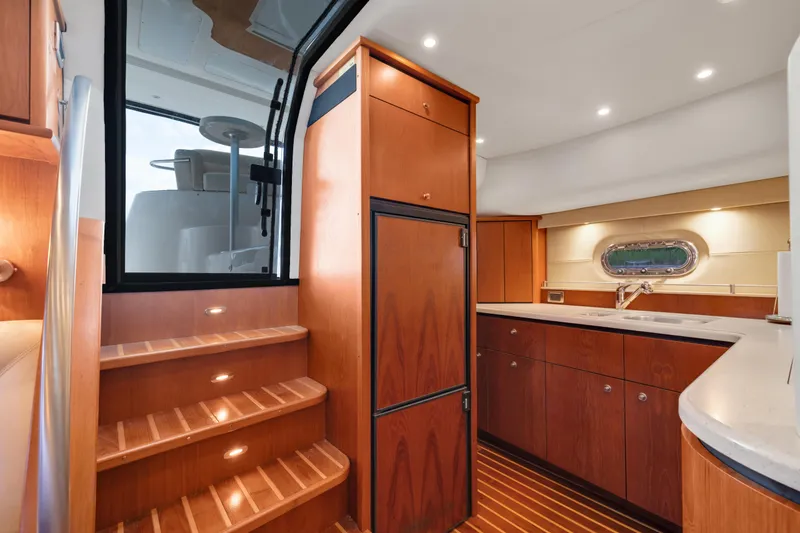 Slide: The Image of Interior of 2006 Tiara Yachts 4300 Sovran with wood finish. - 14