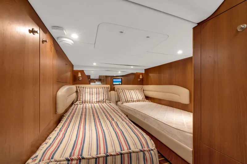 Slide: The Image of Interior of 2006 Tiara Yachts 4300 Sovran with twin beds. - 22