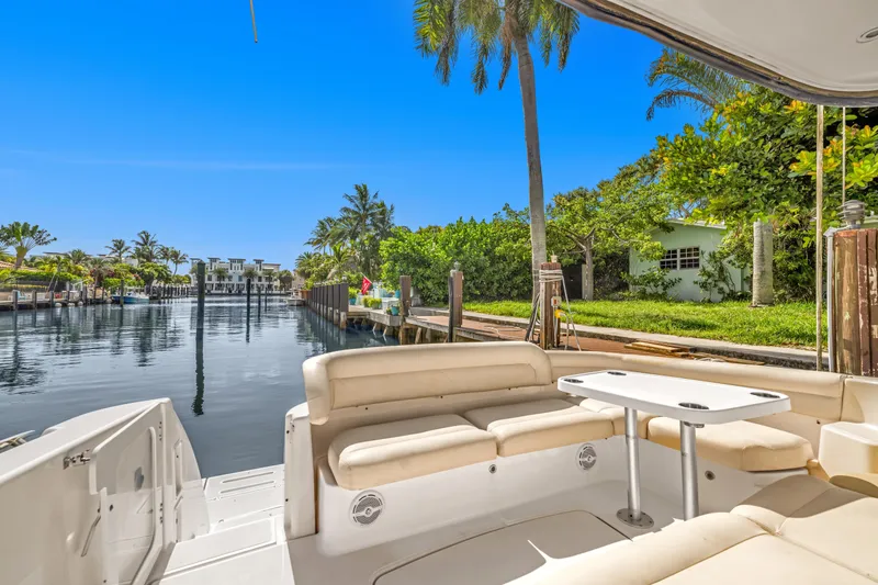 Slide: The Image of Tiara Yachts 4300 Sovran 2006, luxurious boat rear seating with waterfront view. - 7