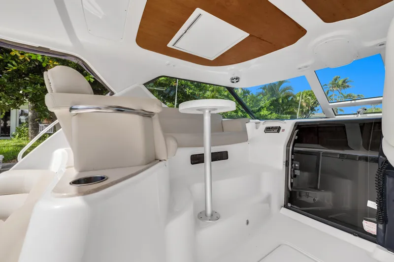 Slide: The Image of Interior of 2006 Tiara Yachts 4300 Sovran with seating area. - 9