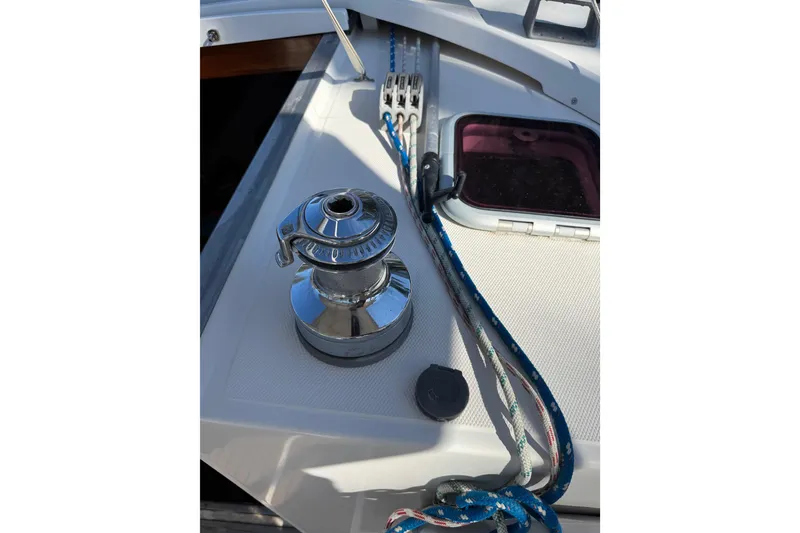 Slide: The Image of Winch and ropes on 2006 Shannon Shoalsailer sailboat deck. - 10