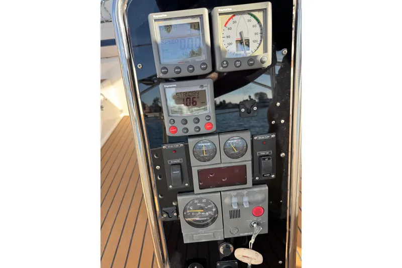 Slide: The Image of Control panel of a 2006 Shannon Shoalsailer with various navigation instruments and gauges. - 11