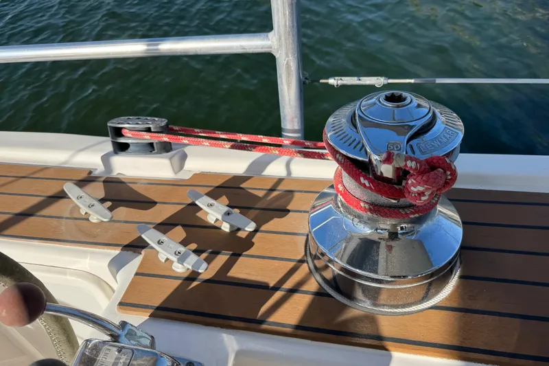 Slide: The Image of Winch and cleats on 2006 Shannon Shoalsailer sailboat deck. - 3