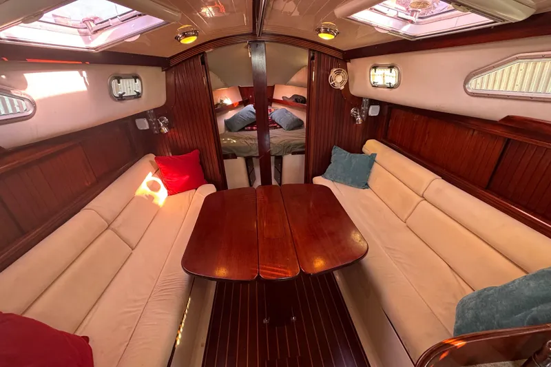 Slide: The Image of Luxurious 2006 Shannon Shoalsailer interior with elegant wood finish and cozy seating. - 7