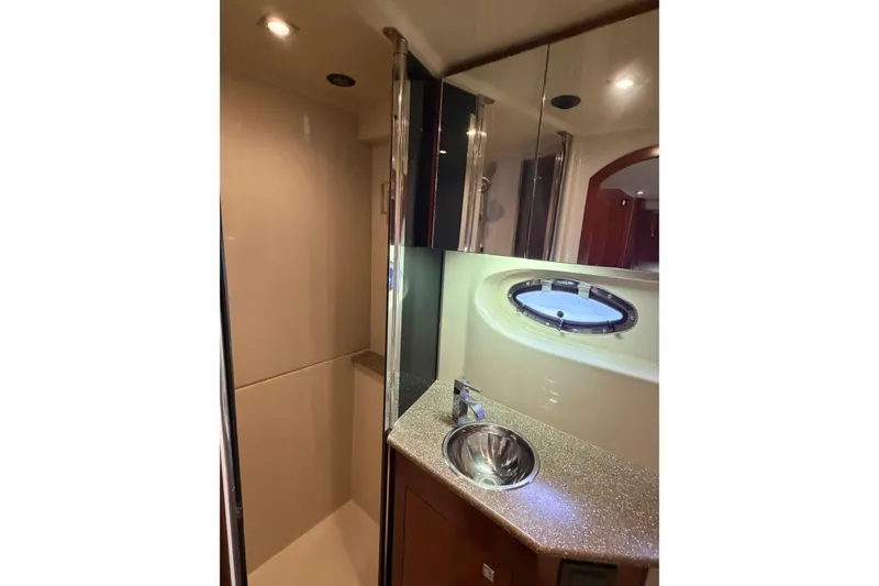 Slide: The Image of Luxurious bathroom in 2011 Cruisers Yachts 415 Express Motoryacht with modern fixtures. - 23