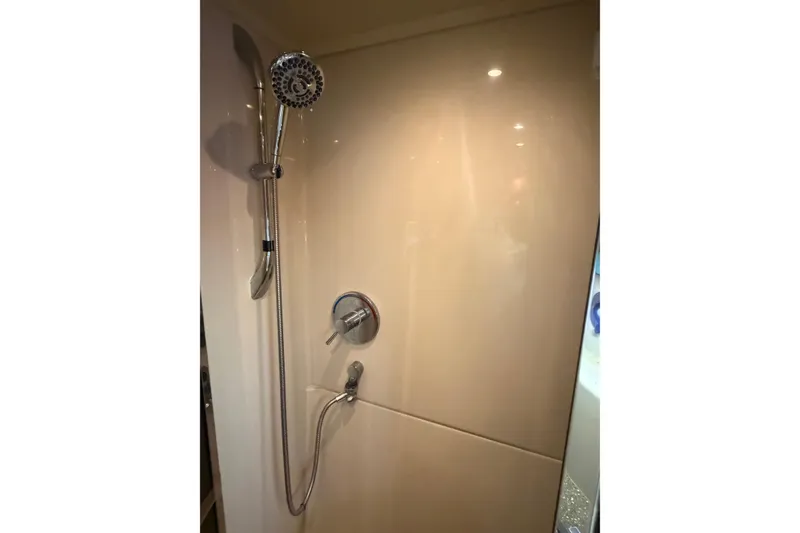 Slide: The Image of Shower area in 2011 Cruisers Yachts 415 Express Motoryacht, featuring modern fixtures. - 24