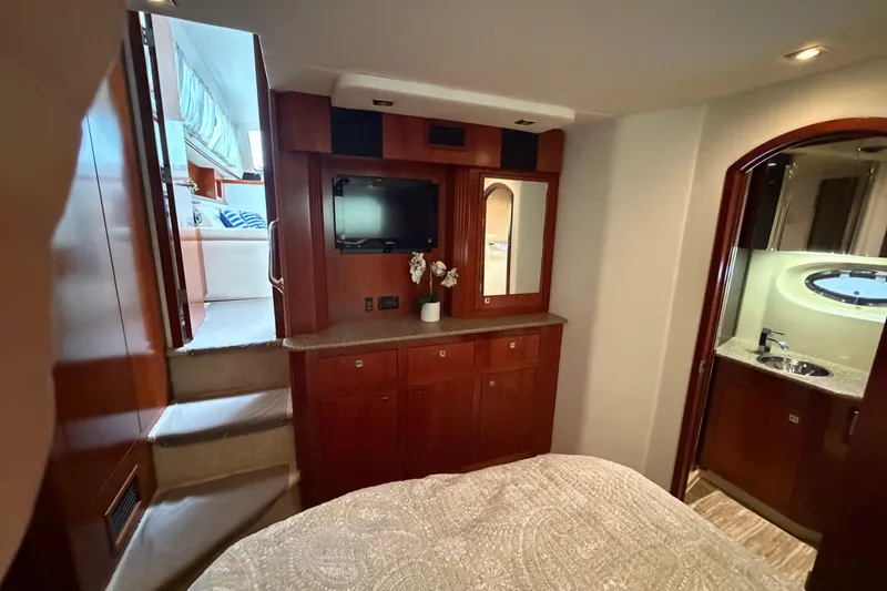 Slide: The Image of Luxurious interior of 2011 Cruisers Yachts 415 Express Motoryacht with wood cabinetry and modern amenities. - 26