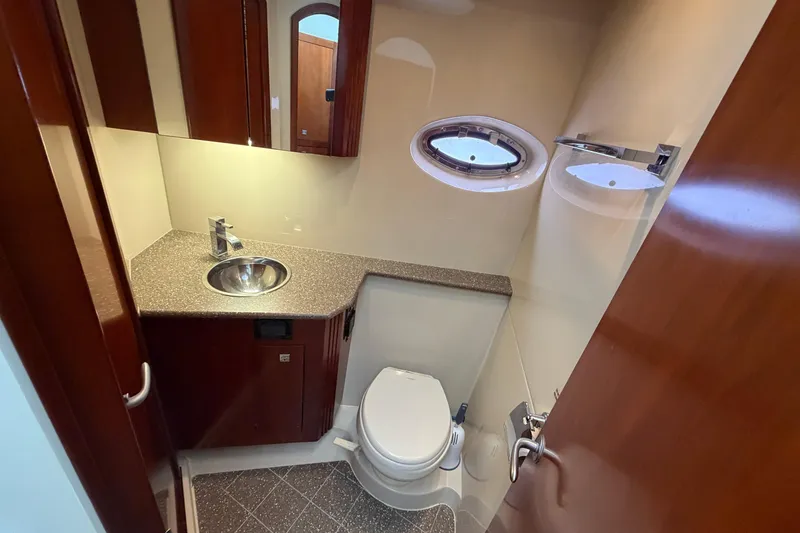 Slide: The Image of Luxurious bathroom in 2011 Cruisers Yachts 415 Express Motoryacht with modern fixtures. - 33