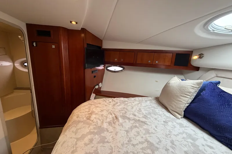 Slide: The Image of Luxurious cabin interior of 2011 Cruisers Yachts 415 Express Motoryacht with cozy bedding. - 34