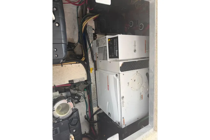 Slide: The Image of Engine compartment of 2011 Cruisers Yachts 415 Express Motoryacht with Cummins Onan generator. - 42