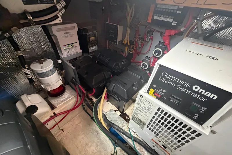 Slide: The Image of Engine room of 2011 Cruisers Yachts 415 Express Motoryacht with Cummins Onan marine generator. - 44